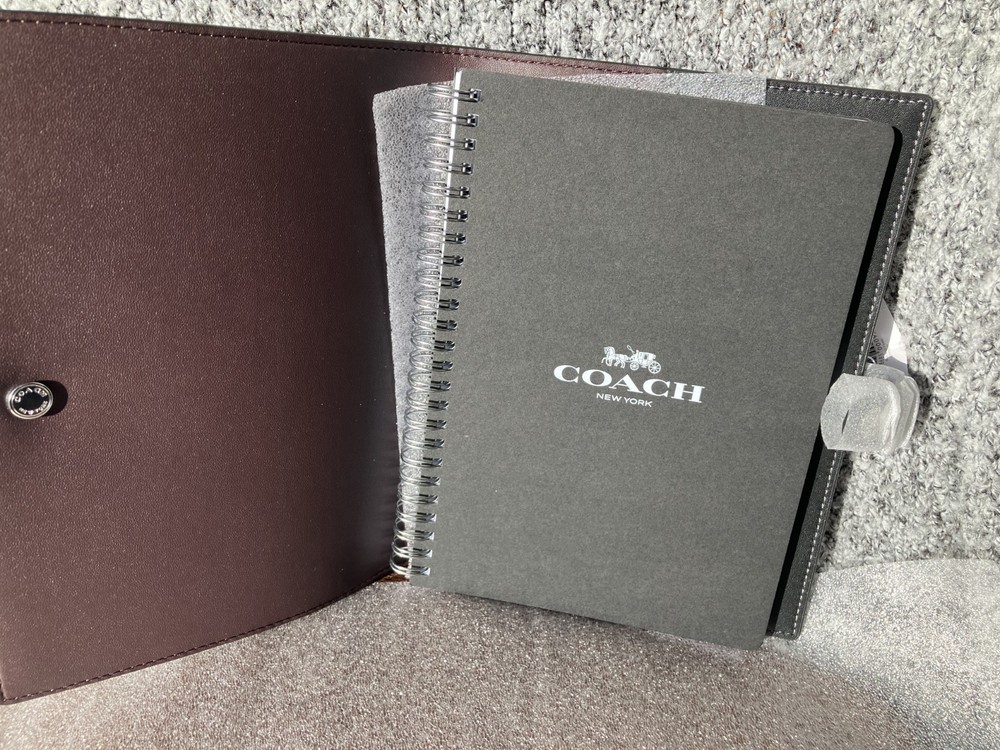 NWT Coach Notebook Cherry with gold/black multi 100% authentic. Purchased direct