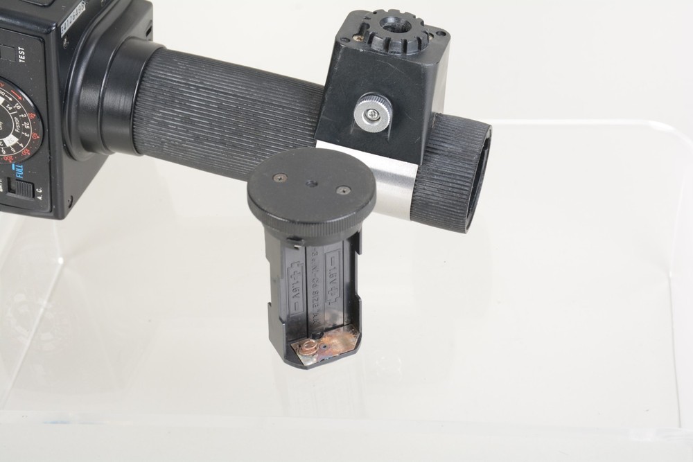 Sunpak Auto 511 Handle Mount Flash w/ Bracket. Fair condition. Tested Good 498