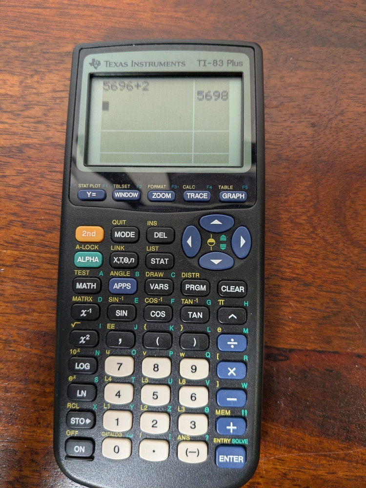 Texas Instruments TI-83 Handheld Graphing Calculator Tested includes Batteries