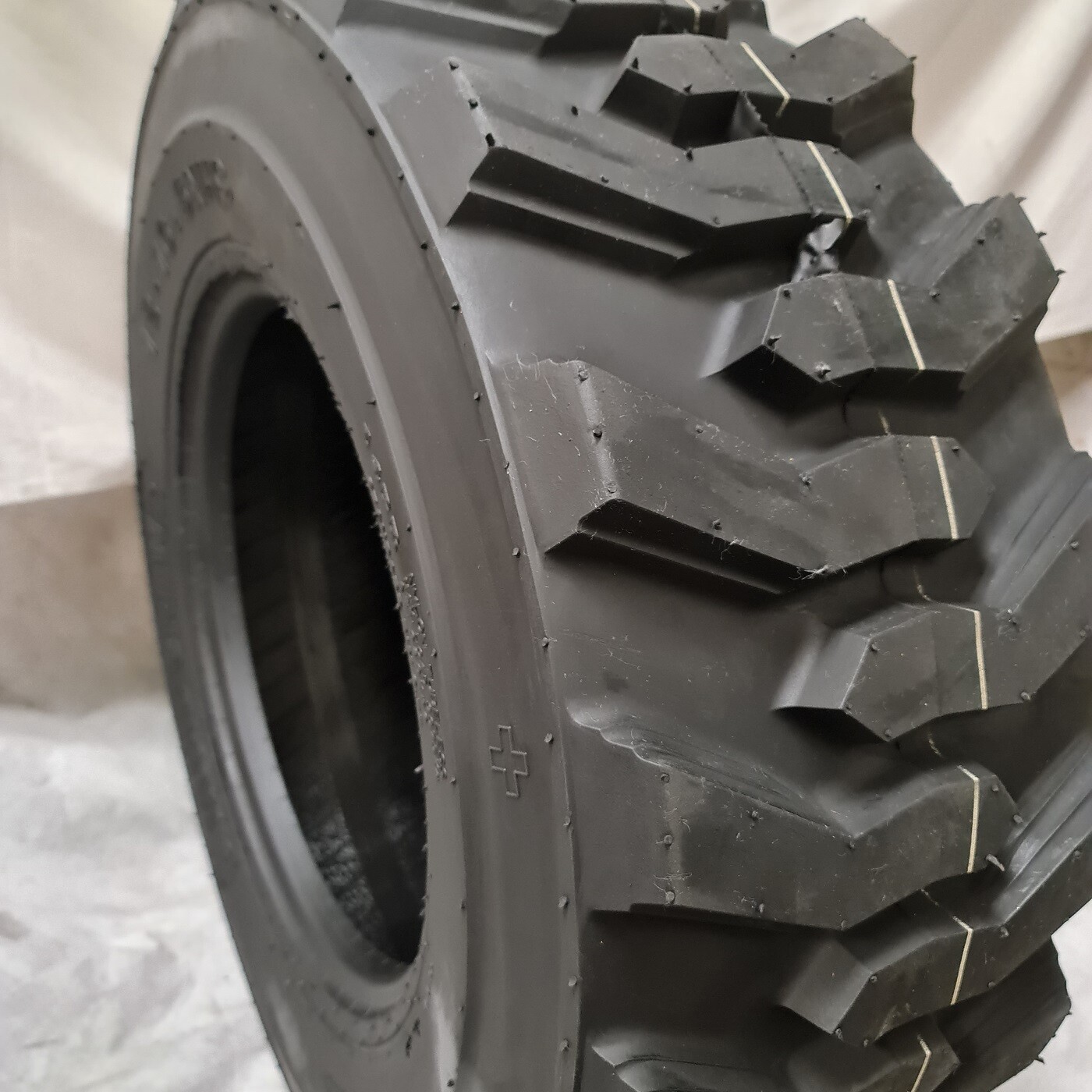 12-16.5, 12x16.5 ROAD CREW NHS 14 PLY SKID STEER TIRES FOR BOBCAT DEEPER TREAD