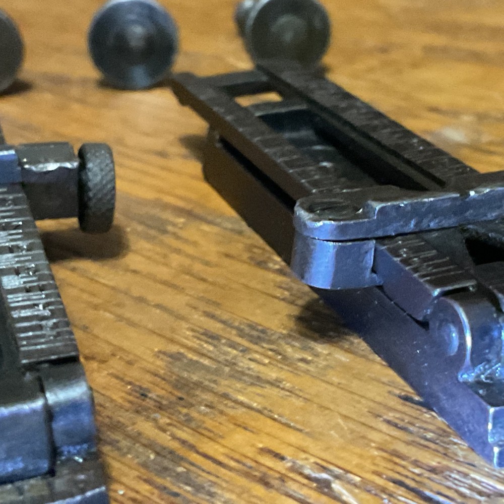 Remington 1903 sight base, leaf, slide, elevation, windage knobs marked R. 1 set
