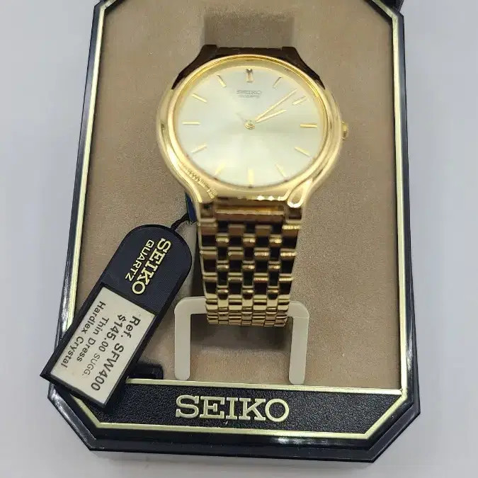 NOS Seiko Quartz Dress Watch Gold SFW400 Champagne Dial