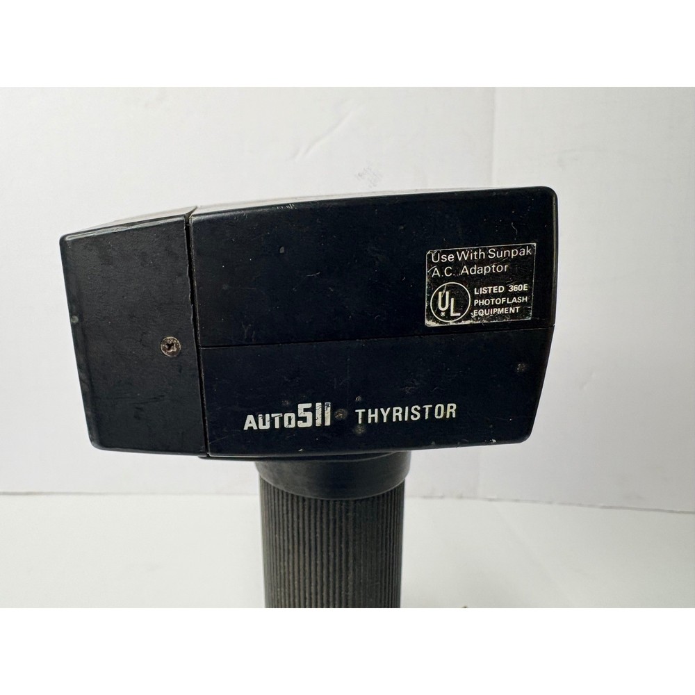 Sunpak Auto 511 Thyristor Handle Mount Flash with Bracket and Sync Cord Black