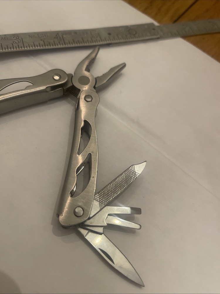 Multi Tool 8 Blades Unbranded