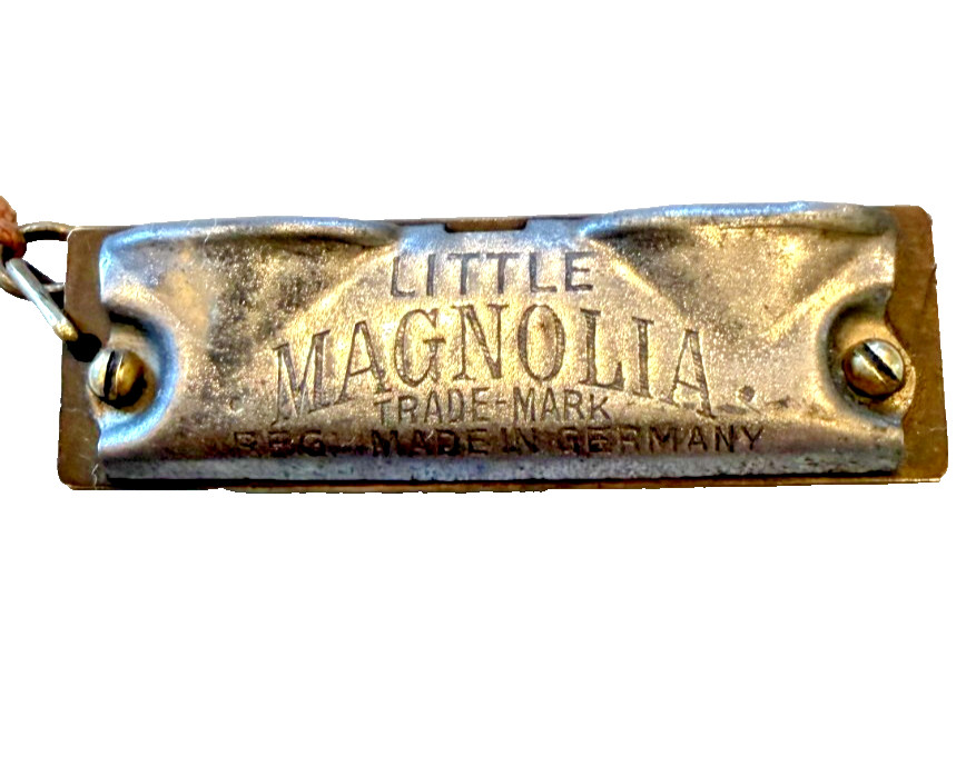 Harmonica mangolia 1930'miniature 5 hole works great