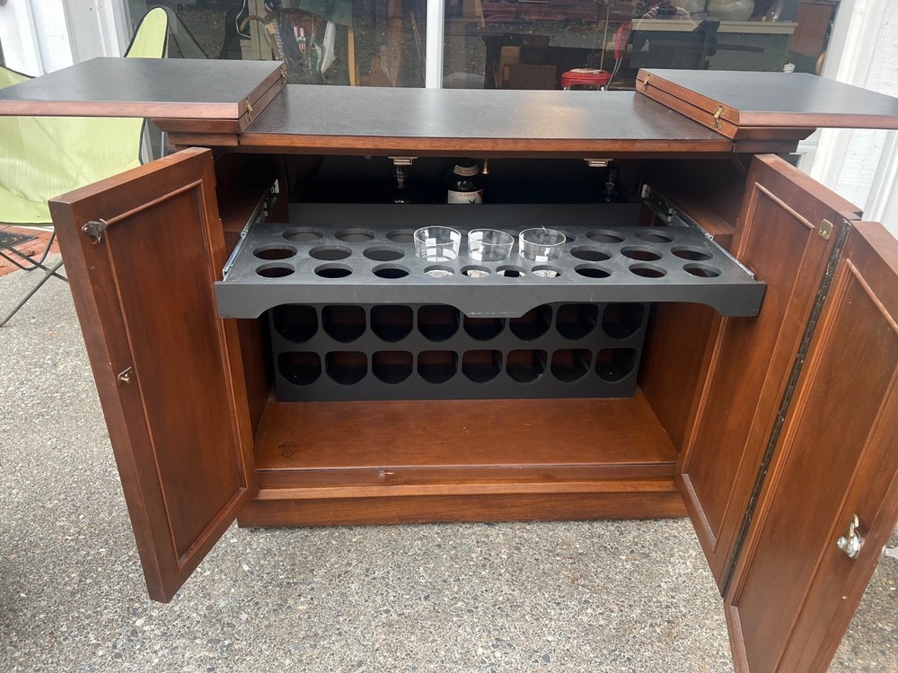 Jasper Cabinets Mid Century rolling walnut bar
