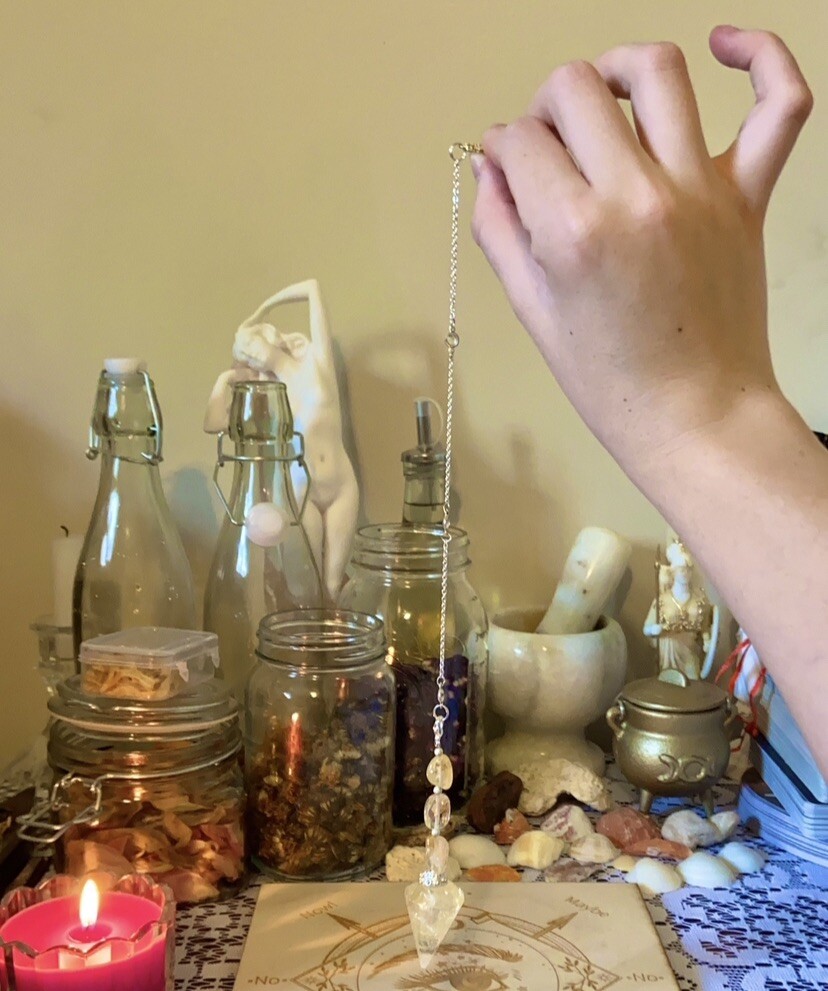 Citrine crystal pendulum and pendulum board