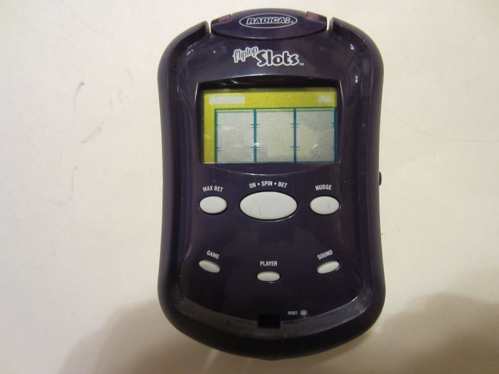 Radica 2006 Fliptop Slots Handheld Electronic Game With Light
