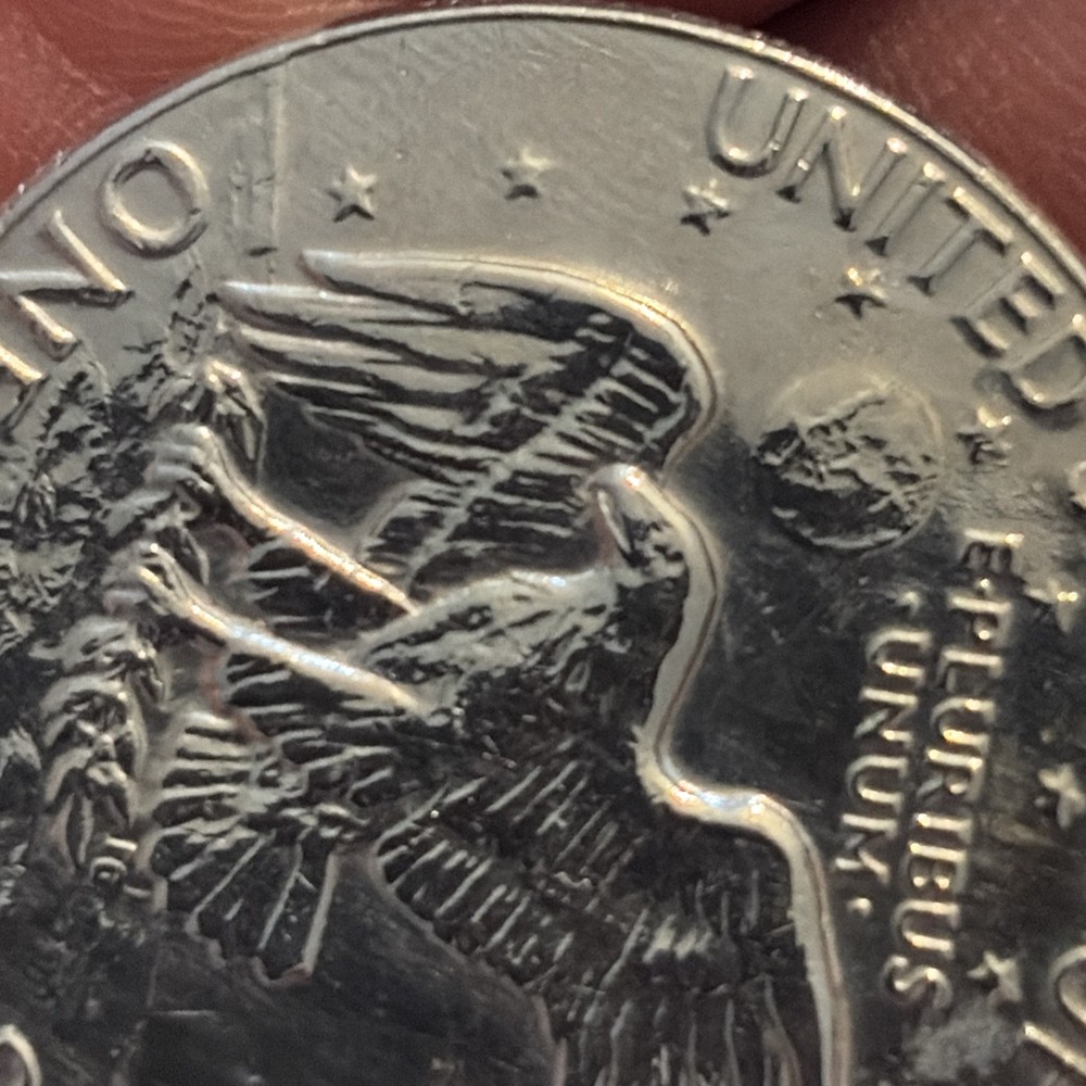 1977 Dollar Coin “Rare” D Minted filled d immaculate!