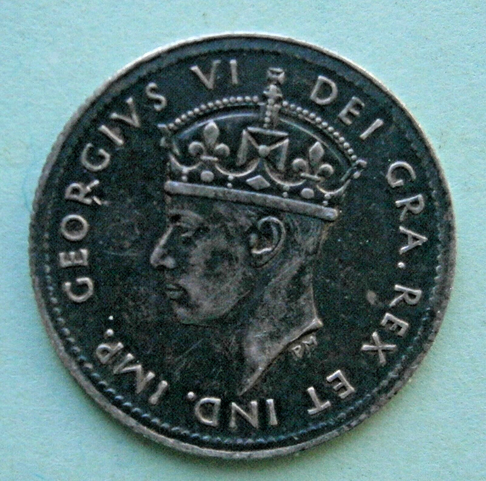CANADA - Newfoundland 1942 Five Cent Silver Coin, circulated.