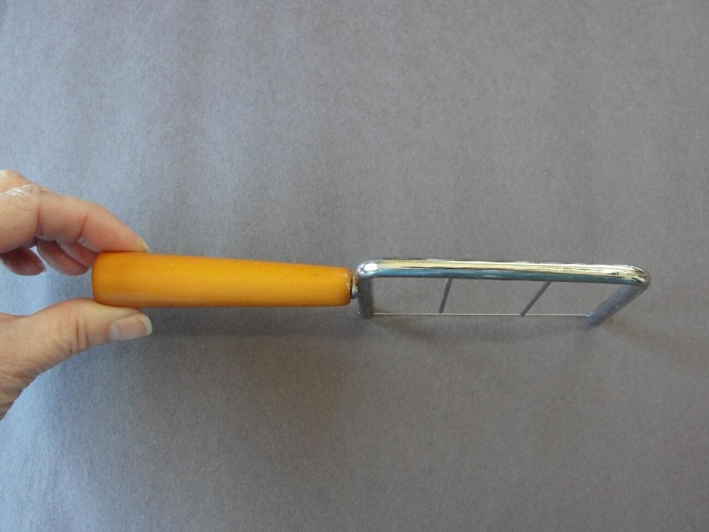 Butterscotch Bakelite Handled Cheese Slicer