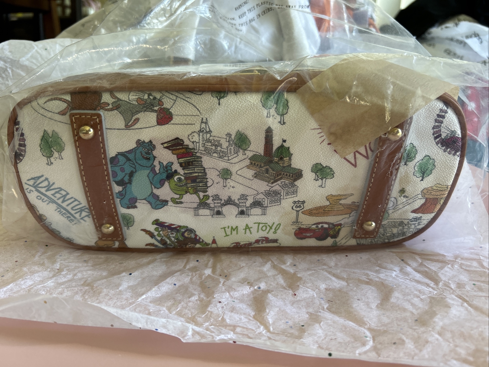 NEW DOONEY BOURKE DISNEYPARKS PIXAR MAP SATCHEL RATATOUILLE INSIDE OUT TOY STORY