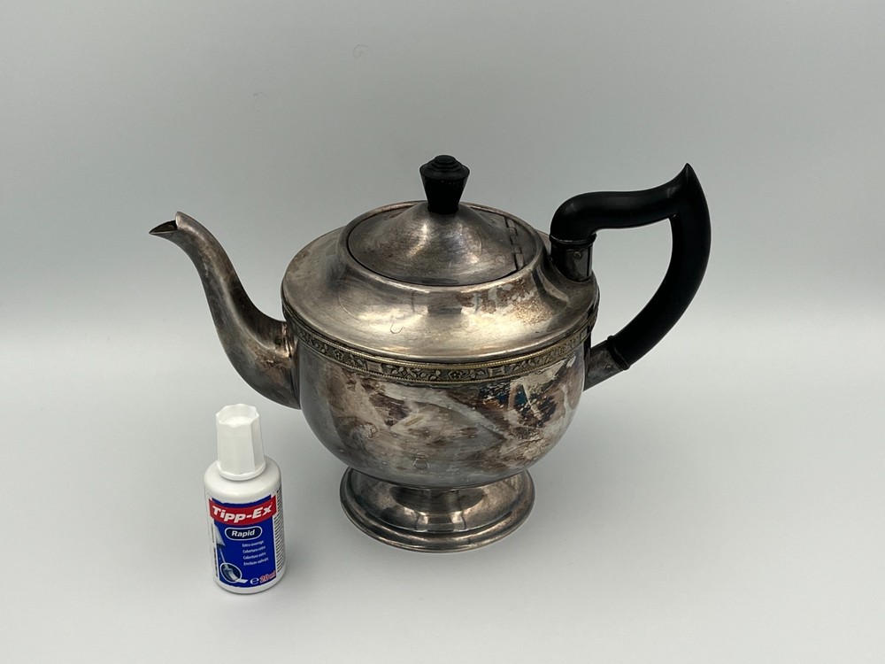 Antique silver plated teapot.
