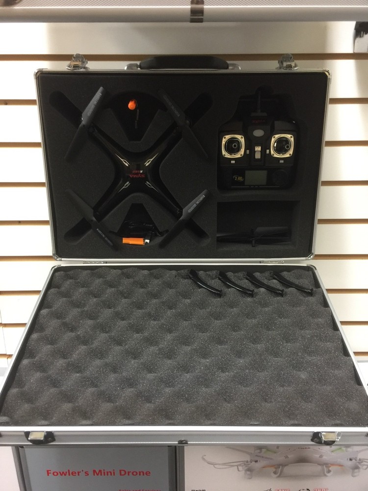 fowlers trainer drone  in really nice case for beginners very durable.