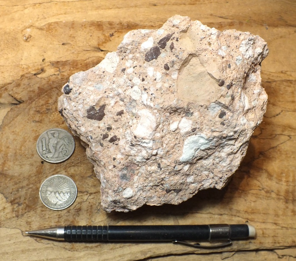 tuff breccia - welded pink volcanic ash with angular clasts - display specimen