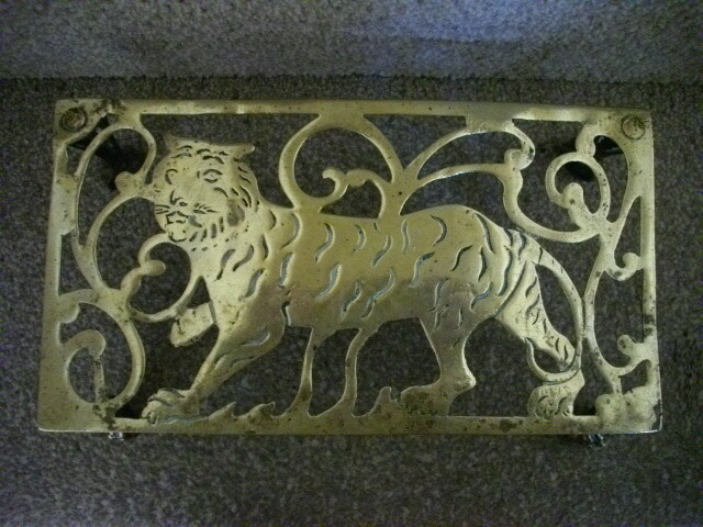 Brass trivet stand with strolling Tiger c1880