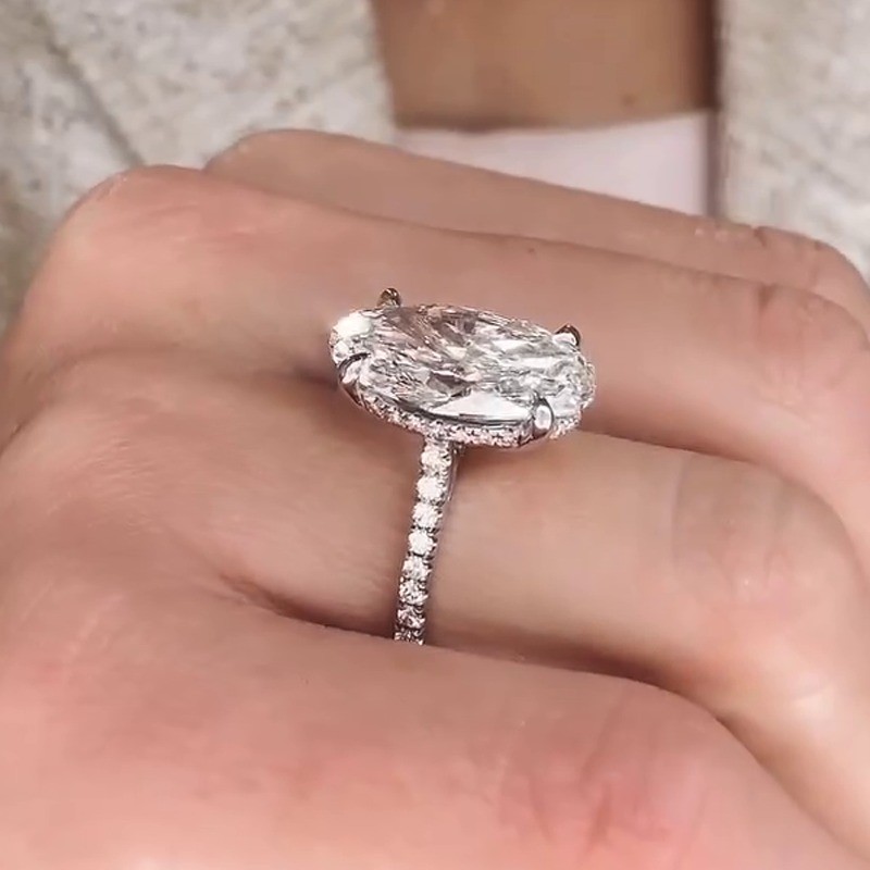 6.3 TCW Oval Cut Moissanite Hidden Halo Engagement Ring In 14k White Gold Plated