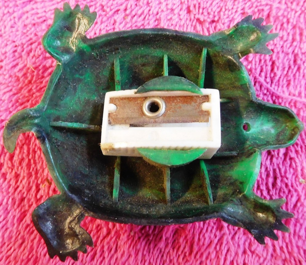 Vintage sterling plastic turtle hand held pencil sharpener