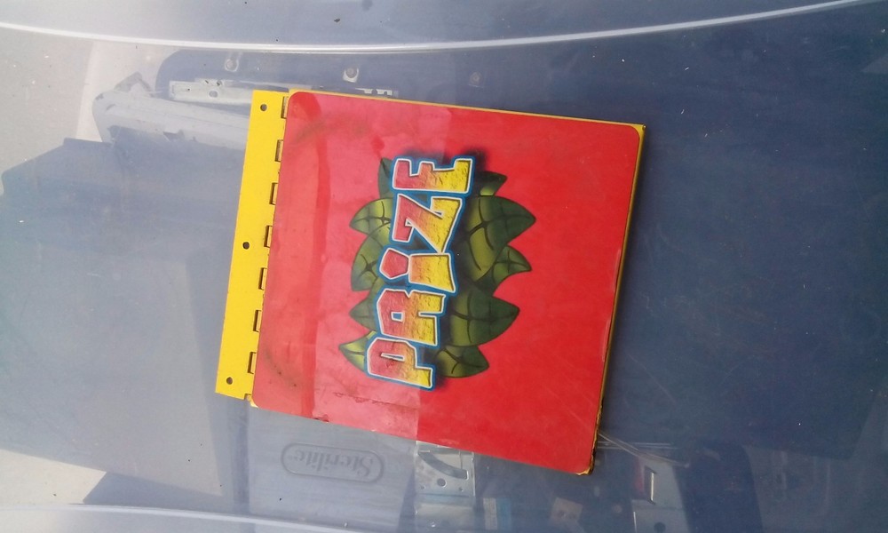 Ice Mighty Mini Dino arcade prize door#2