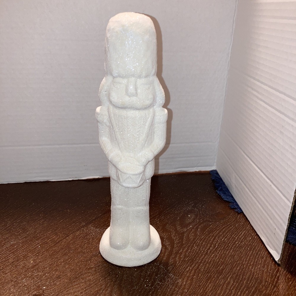 Christmas Ceramic Decor White glitter 10inx2 3/4in nutcracker soldier