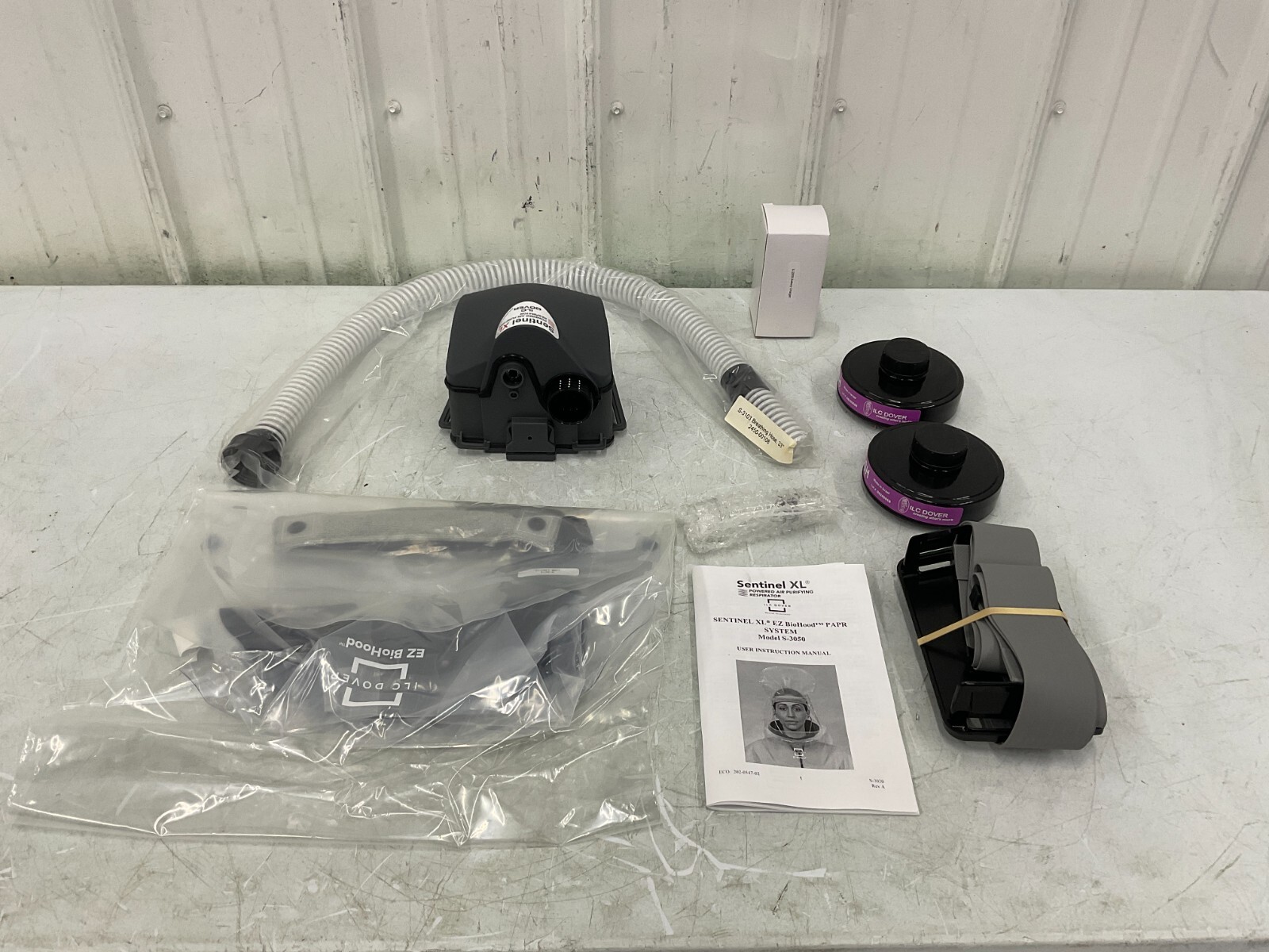 ILC Dover SXL-HPEZR1 PAPR System: Battery, Blower, Charger, Filter, Hood, Adj