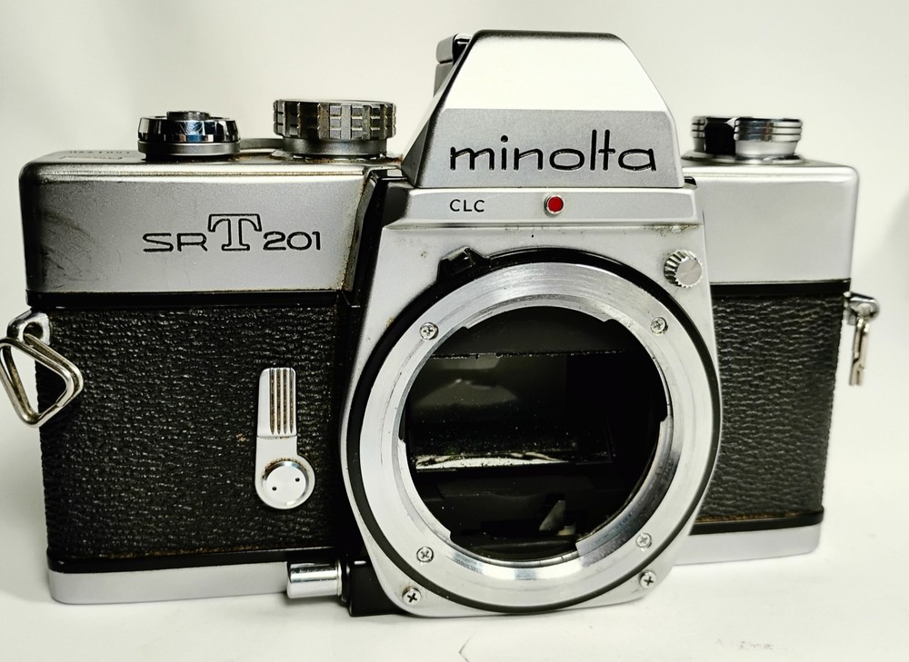 Minolta SRT 201 Camera  Shutter Works Light Meter Untested Sell As-is No Return