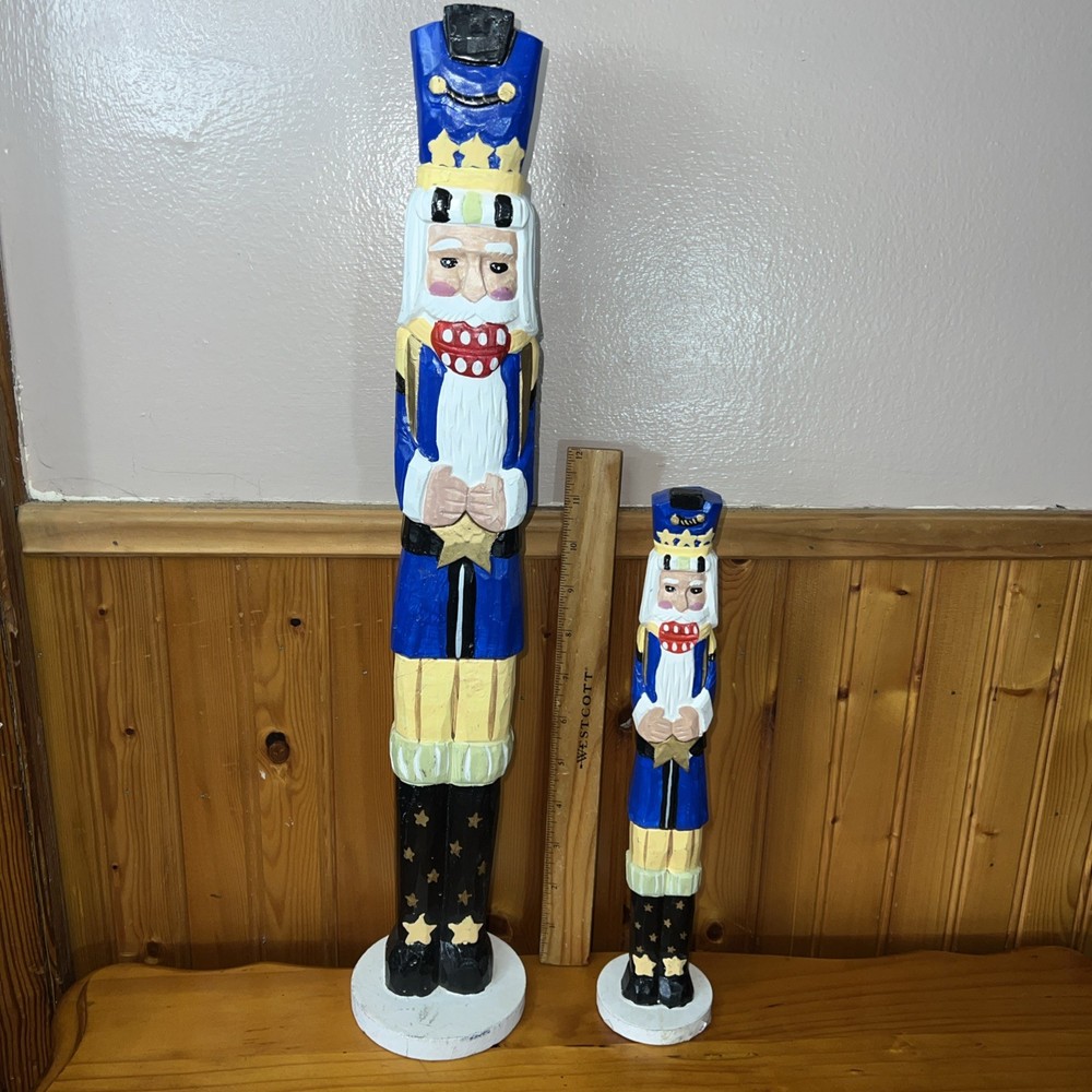 2 Tall decorative nutcracker figurines