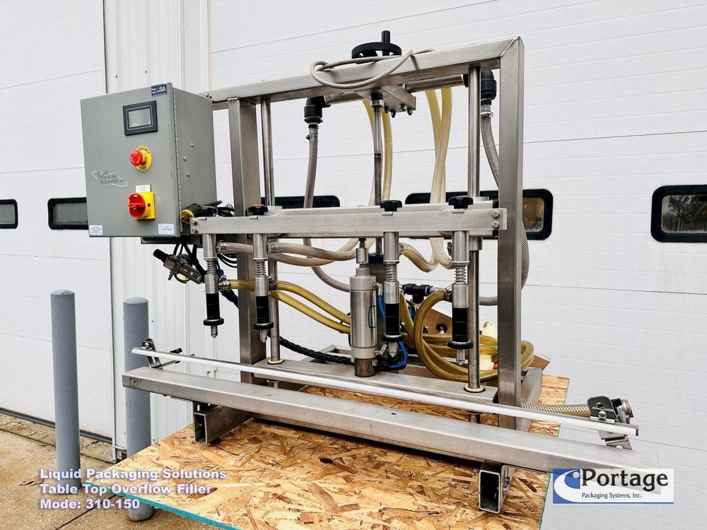 Liquid Packaging Solutions Model: 310-150 || Semi-Automatic Table Top Overflow