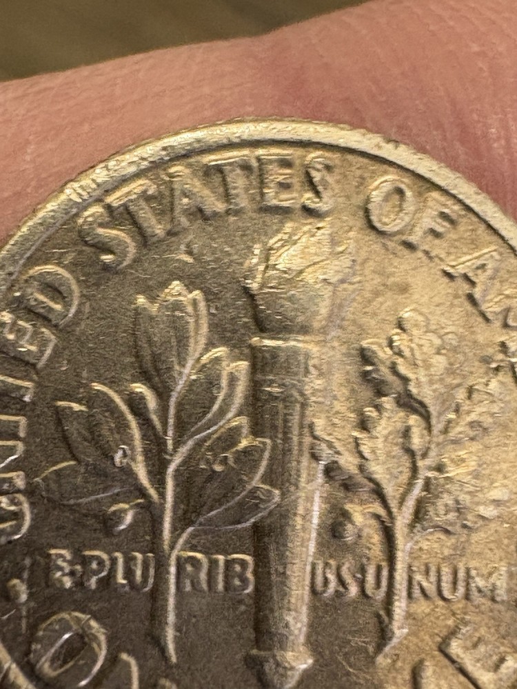 1992 P Roosevelt Dime Error. Struct through grease error.