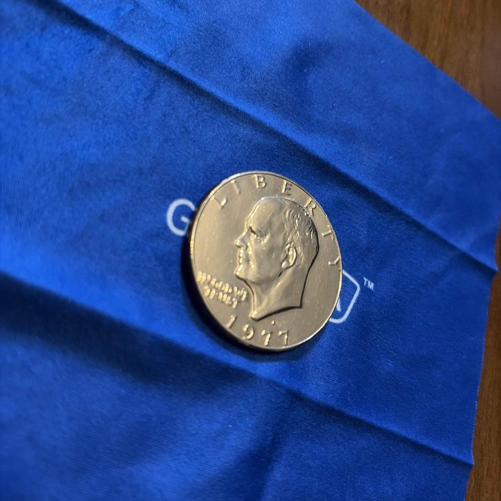 1977 Dollar Coin “Rare” D Minted filled d immaculate!