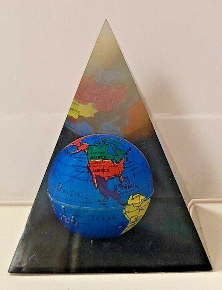 Globe inside Pyramid Paperweight