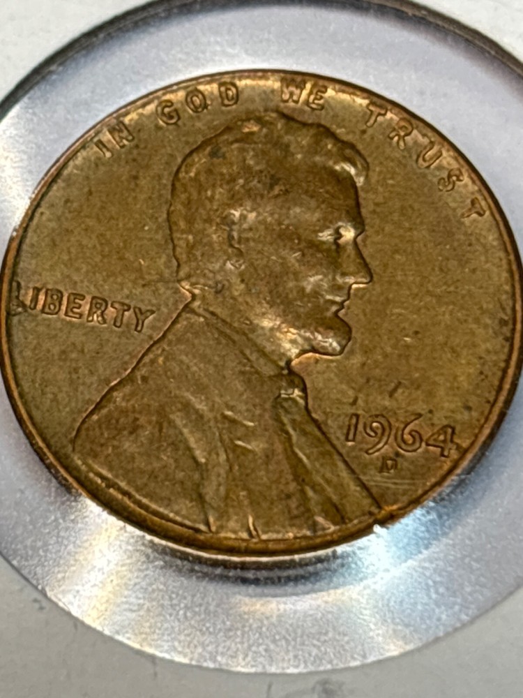1964 D Lincoln Cent Lamination Die Cud by “L” (BROKEN L ERROR)