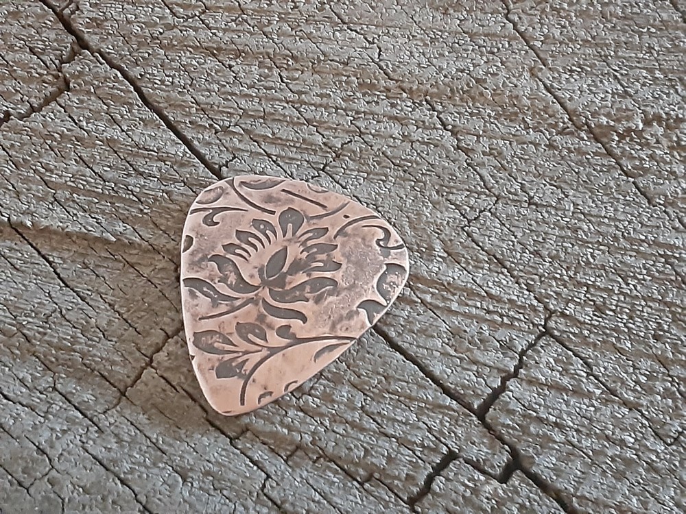 rustic copper guitar pick - playable and handmade - large floral pattern