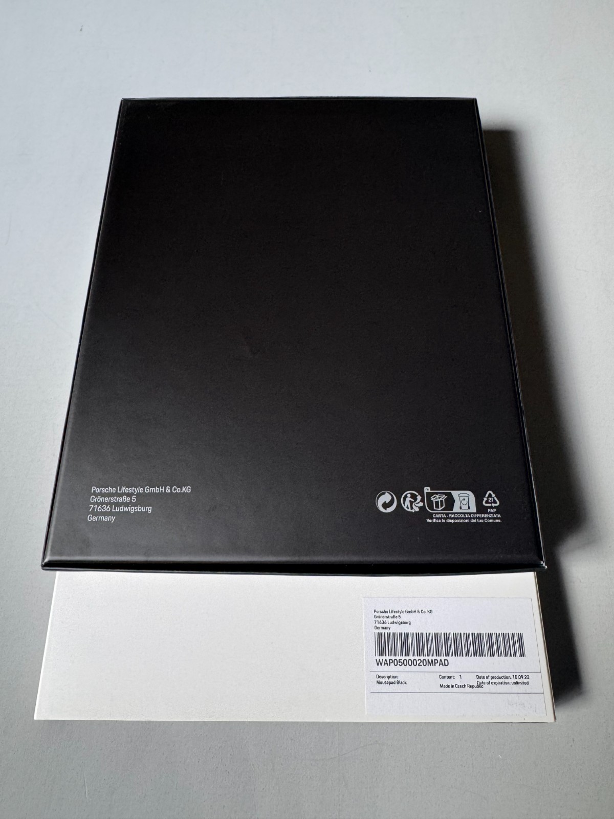 PORSCHE DESIGN EMBOSSED LEATHER COMPUTER MOUSE PAD IN THE SHAPE OF PORSCHE CREST