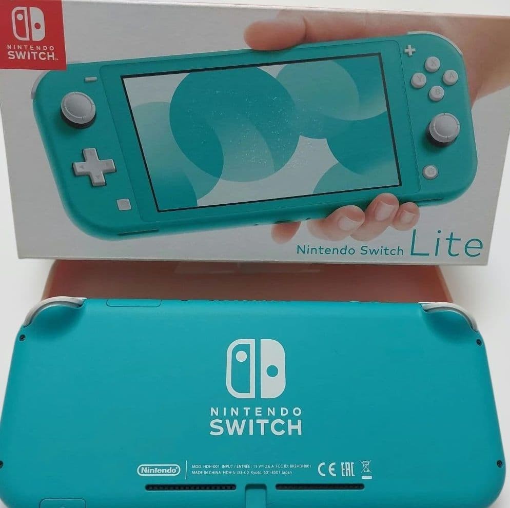 Excellent condition Nintendo Switch Lite Turquoise with outer box