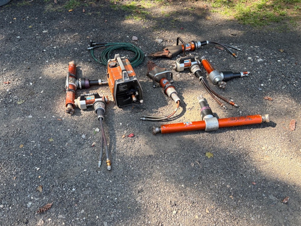 Holmatro rescue tools. Includes gas pump and assorted tools