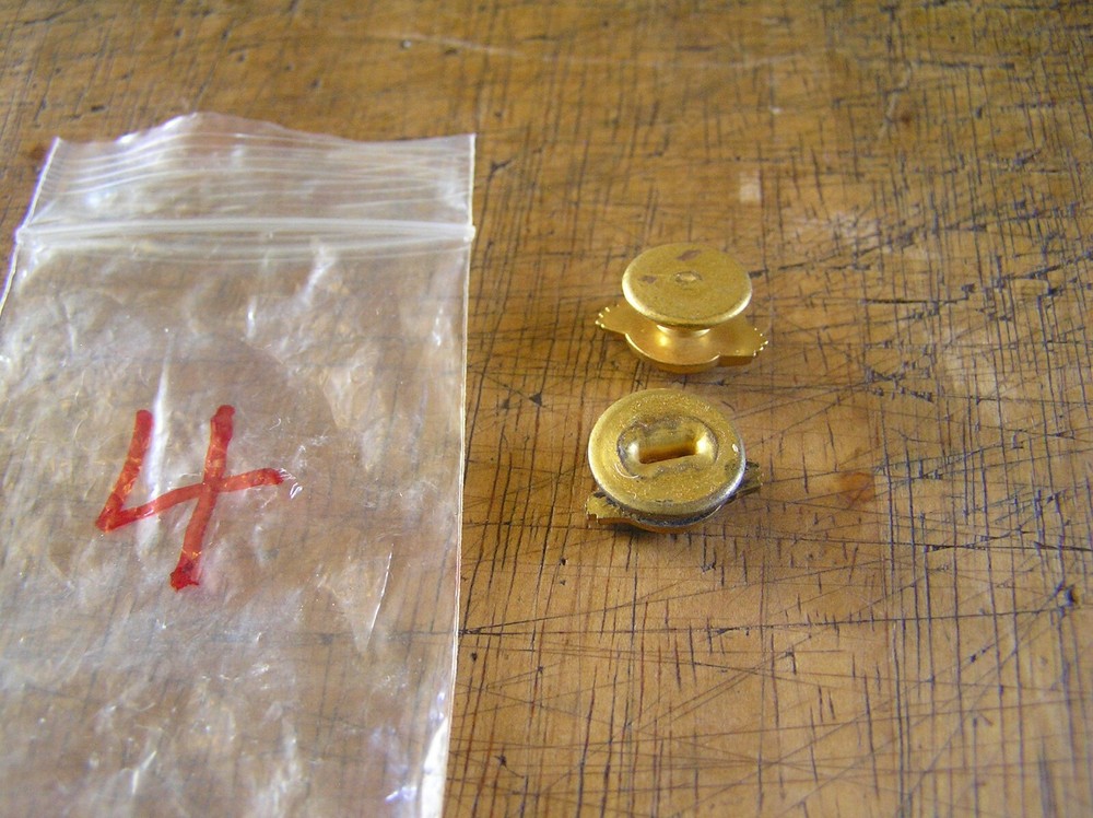 2 Ruptured Duck Honorable Discharge Lapel Buttons