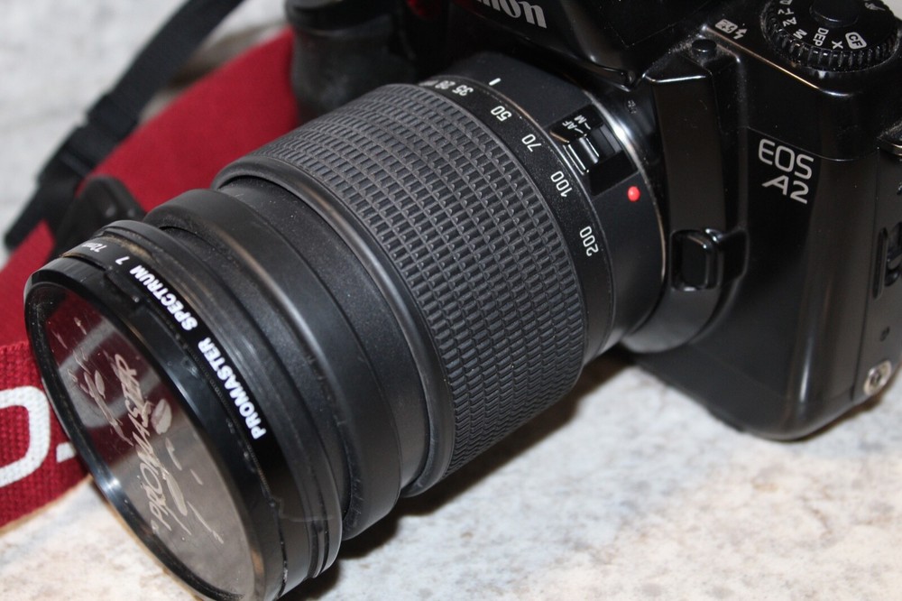 Canon EOSA2 Camera With- 72mm Promaster Lens W/ Strap & Case Bundle