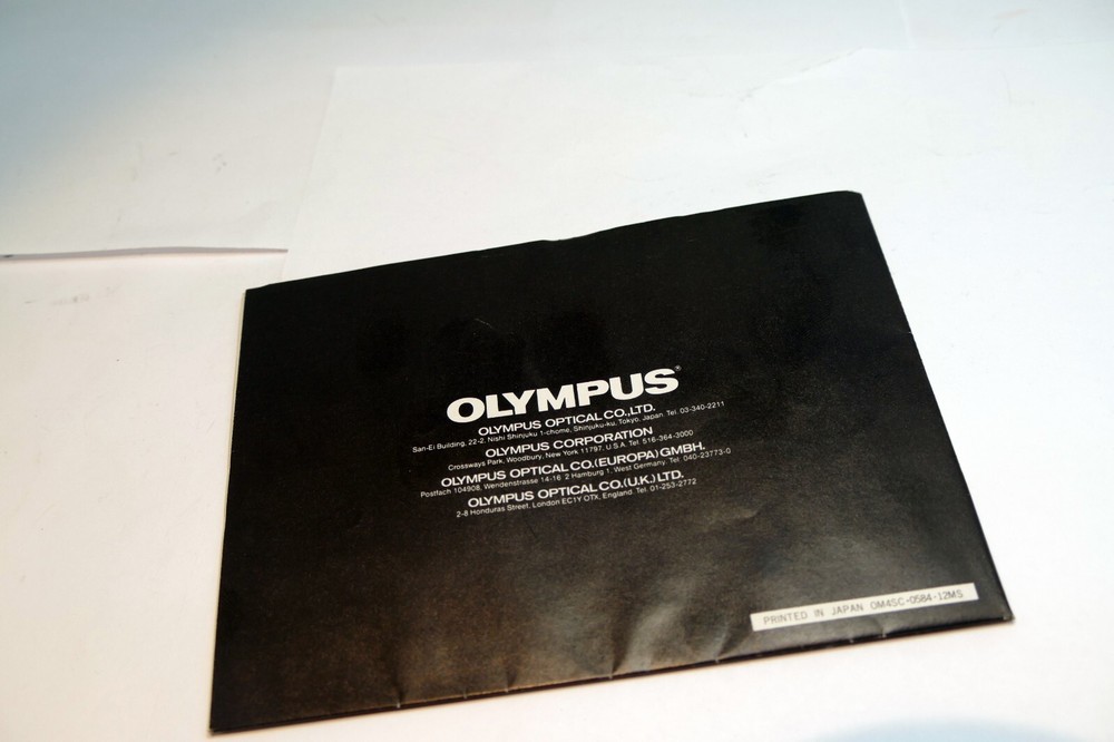 Olympus OM System chart lens accessory guide brochure