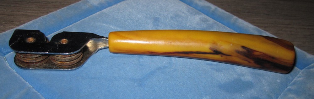 Vintage butterscotch Bakelite handle pull through knife sharpener
