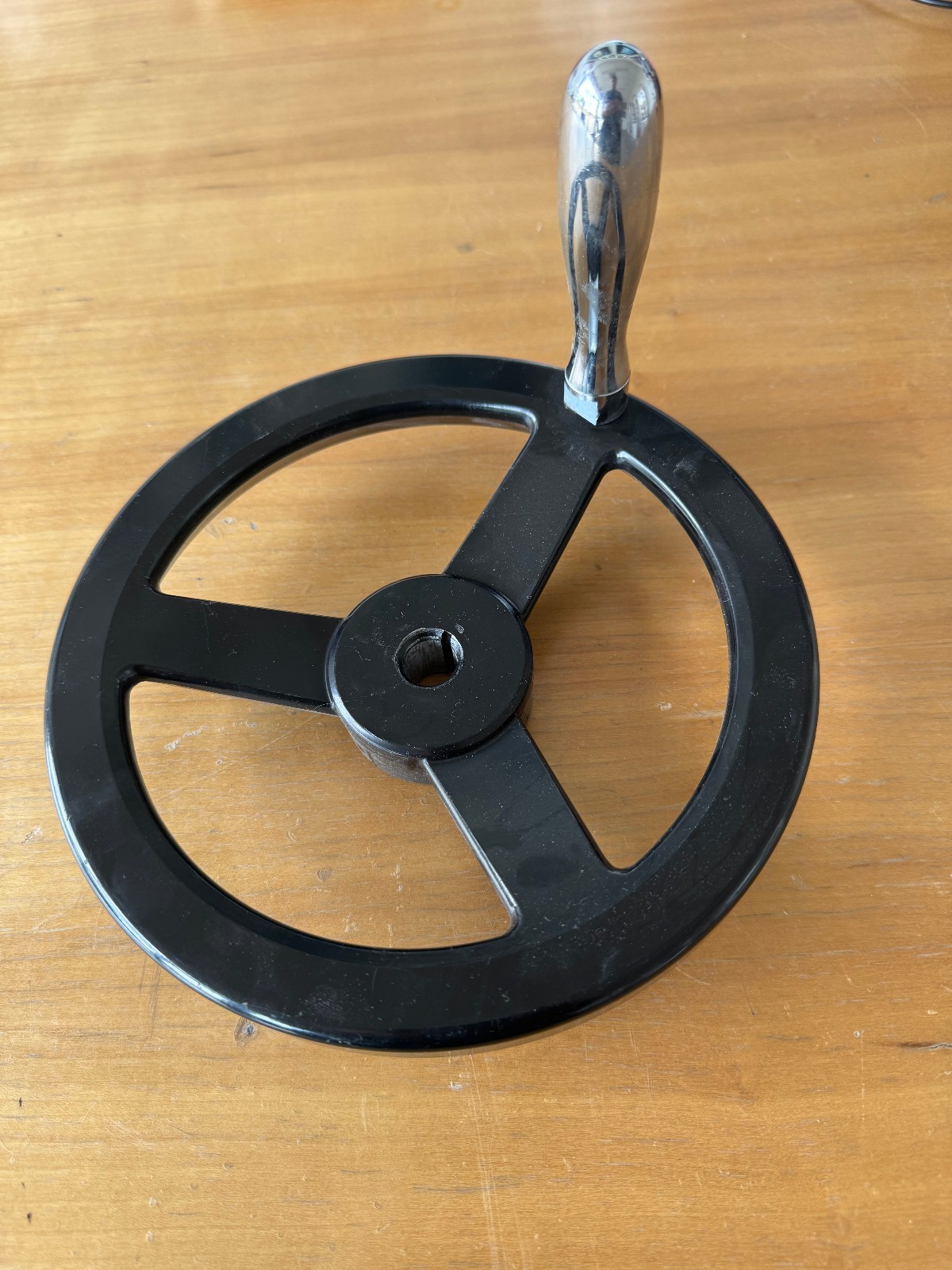 8" aluminum handwheel for 5/8" shaft, 4" swivel handle