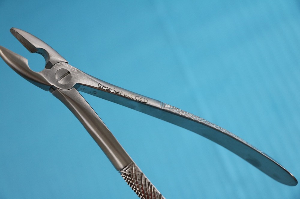NEW GERMAN EXTRACTING EXTRACTION FORCEPS # MD1 MEAD FORCEPS DENTAL INSTRUMENTS