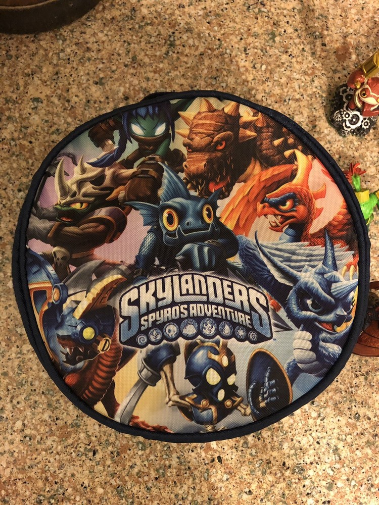 Skylanders Lot - 24 Figures + Carrying Case + Spyro Base.