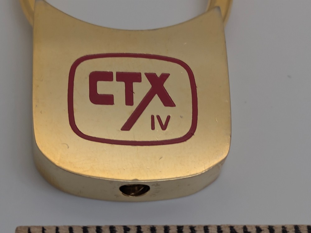 CTX IV Metallic Gold Toned Keyring