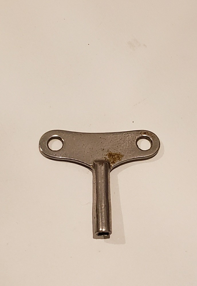 New England Clock Company Pendulum Driven Scroll Clock W/ Key.