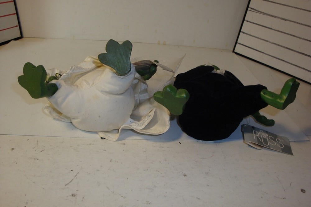 Mr. And Mrs.Pondhopper figures with tags
