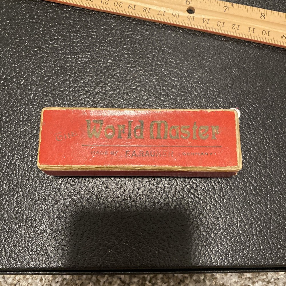 Vintage world master brass harmonica