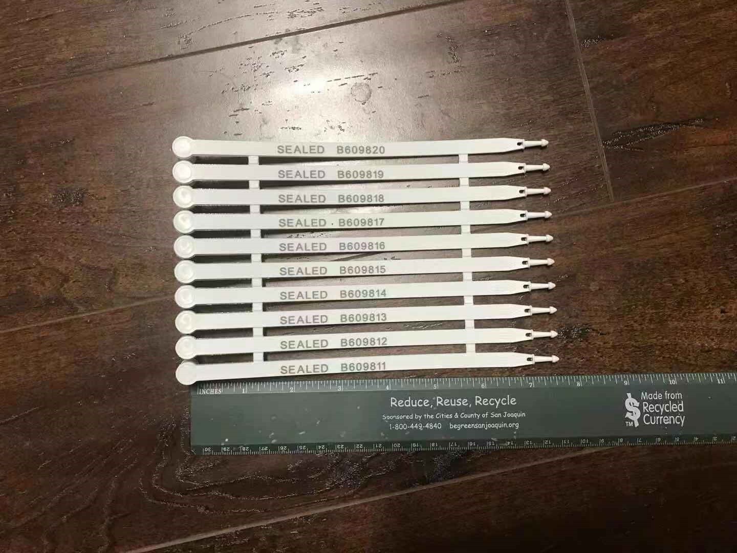 100 White plastic security seals numbered. Truck container seals 7.5 inch