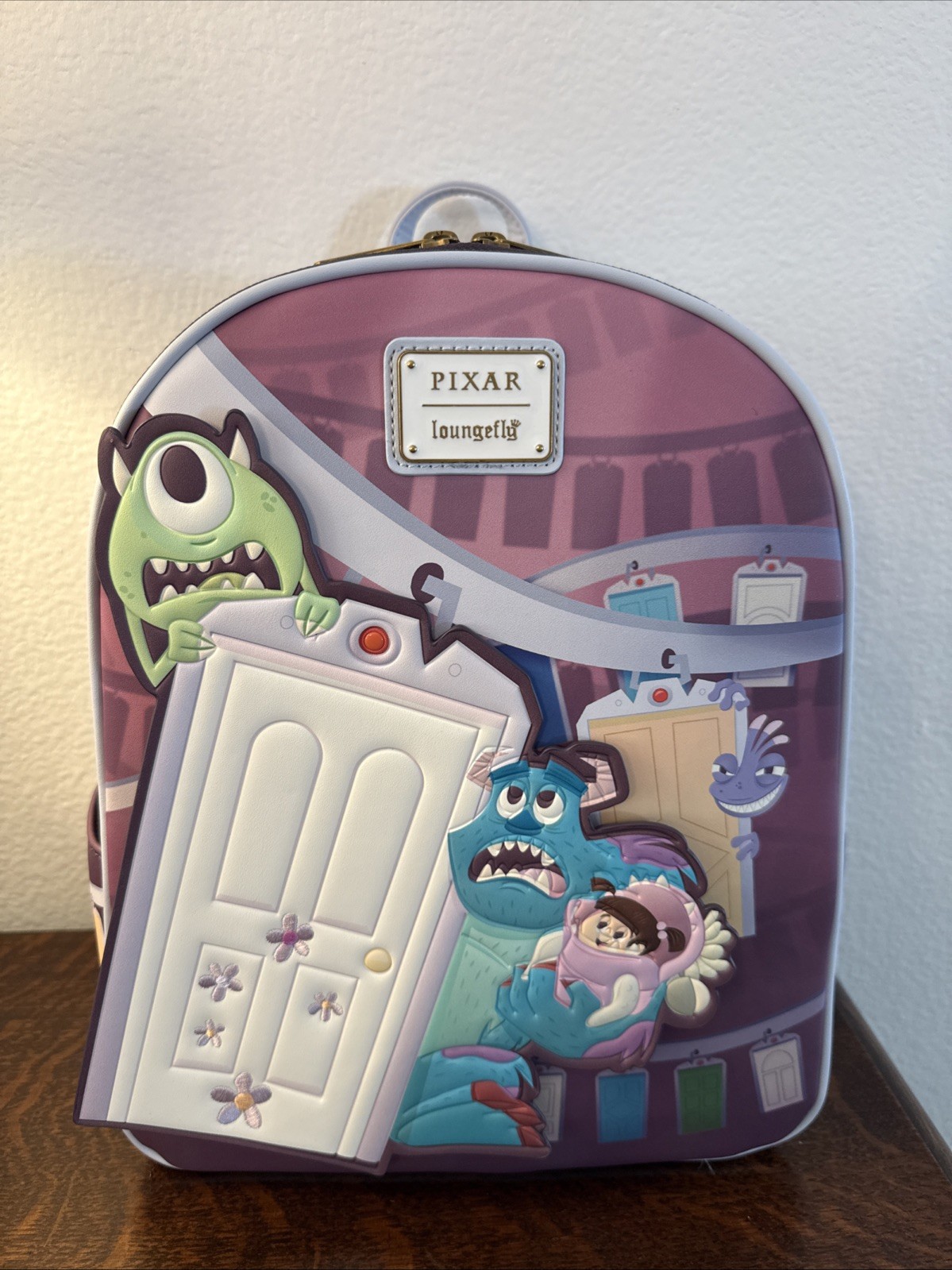 Loungefly Disney Pixar Monsters, Inc. Door Scene Mini Backpack NWT
