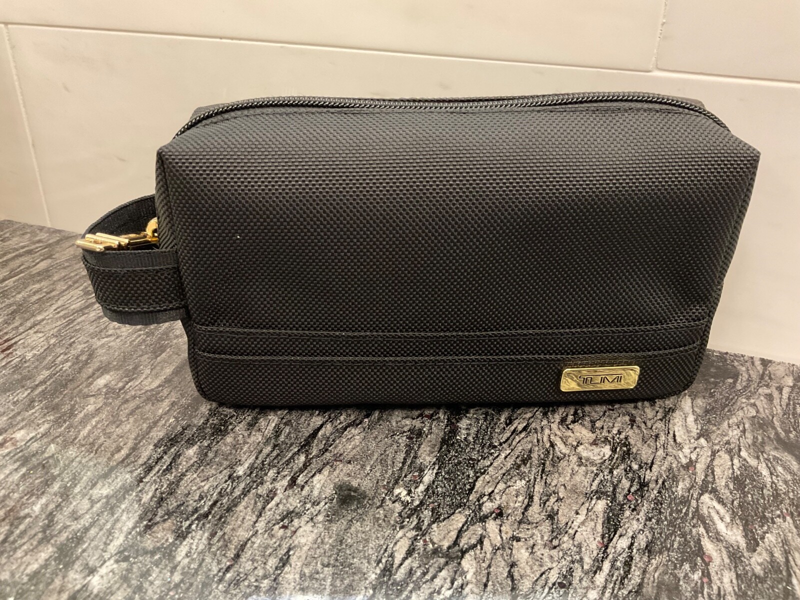 NEW - TUMI Zippered Small Kit - 4”x7” Pouch - Cosmetic Bag - BLACK with GOLD
